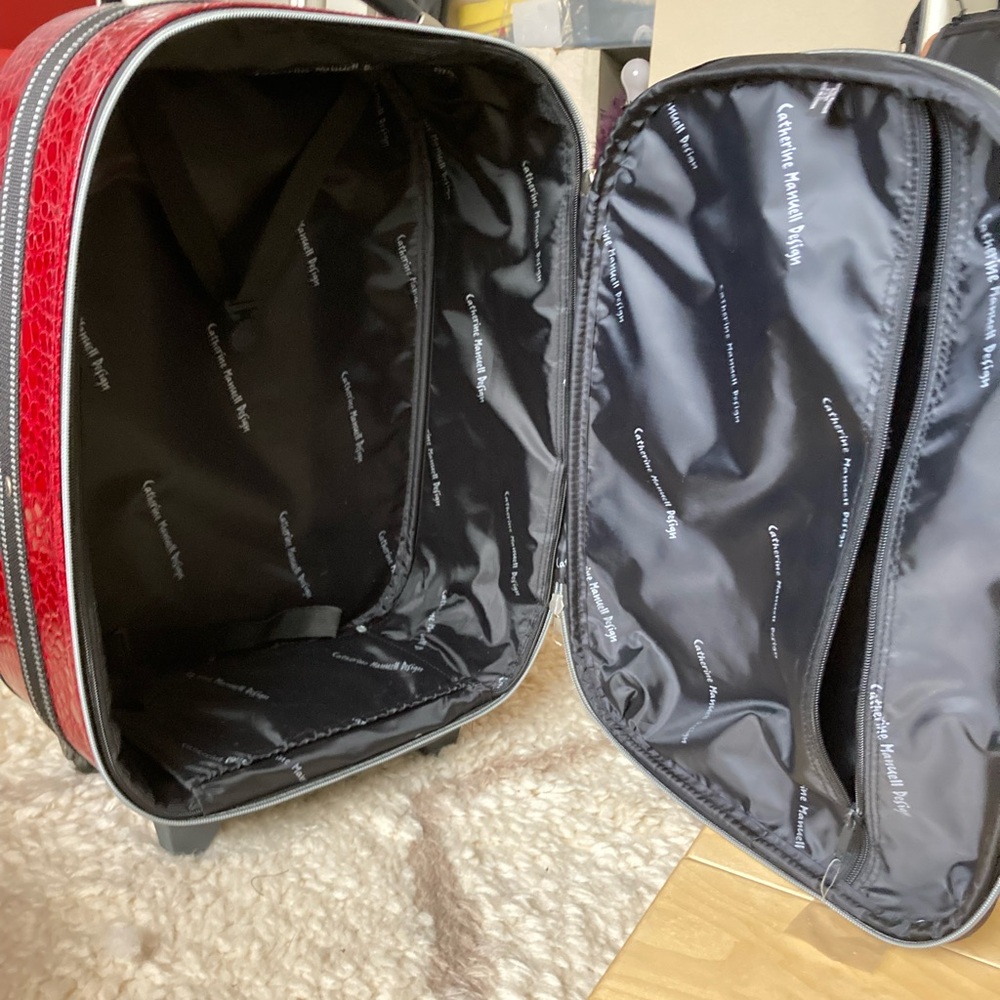 Red Travel Bag with Rounded Shape and Silver Zipper